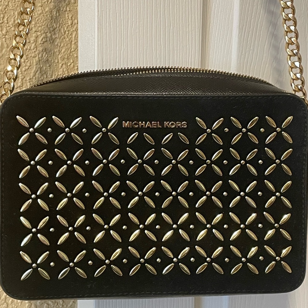Excellent condition Michaelkors leather golden detail